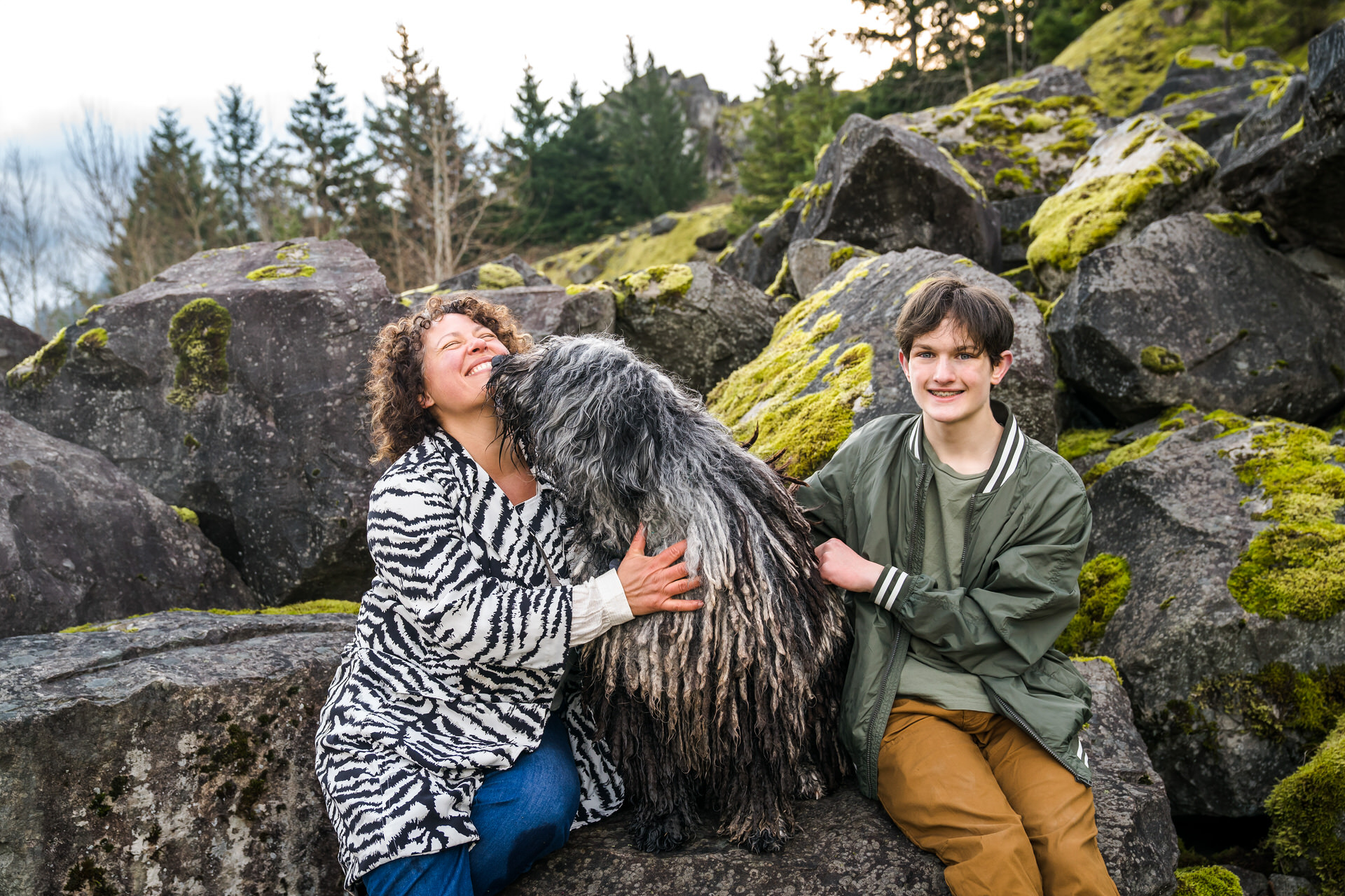 Woman and son with their Bergamasco shepherd