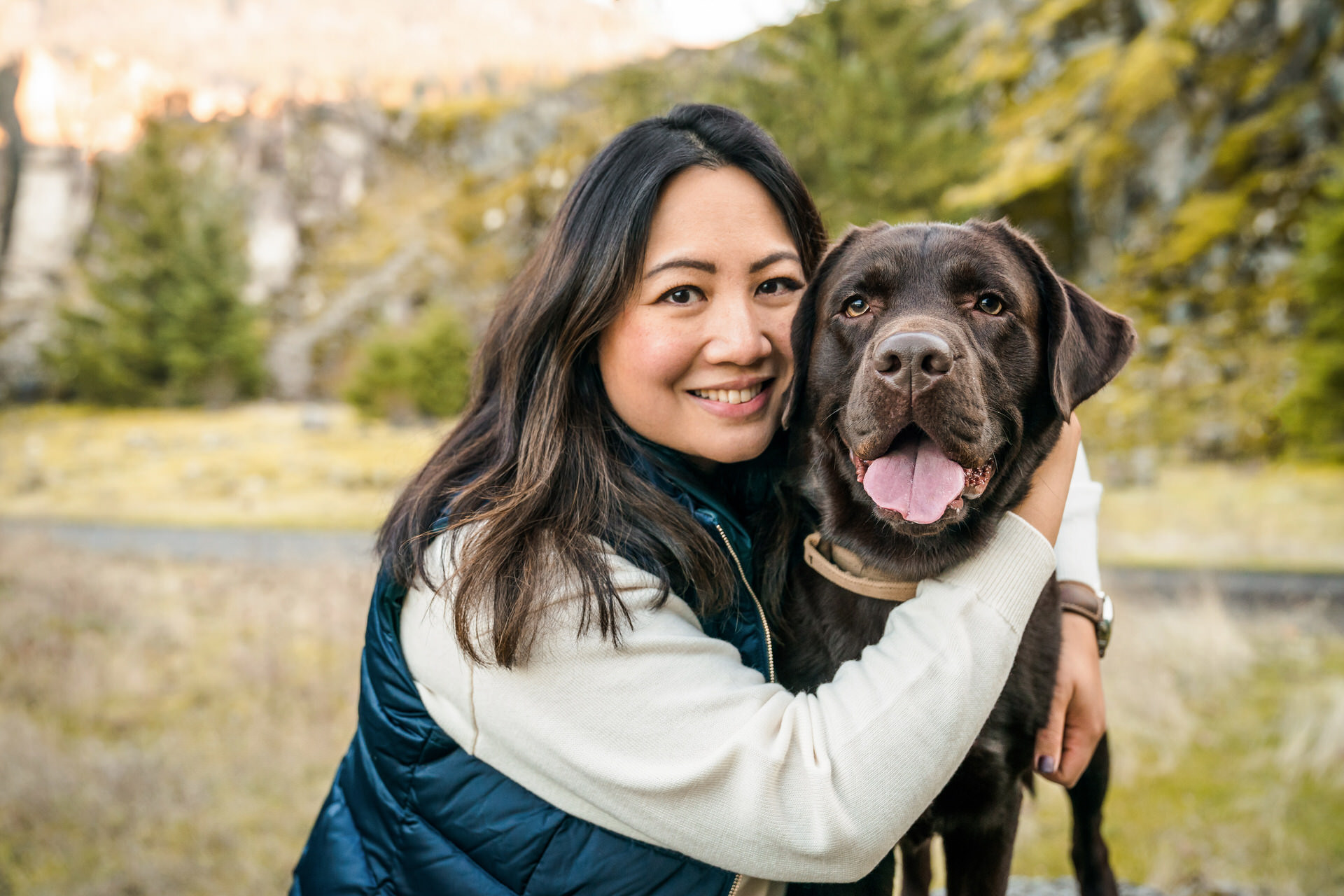 dog and woman pose together at their dog photography session in Oregon